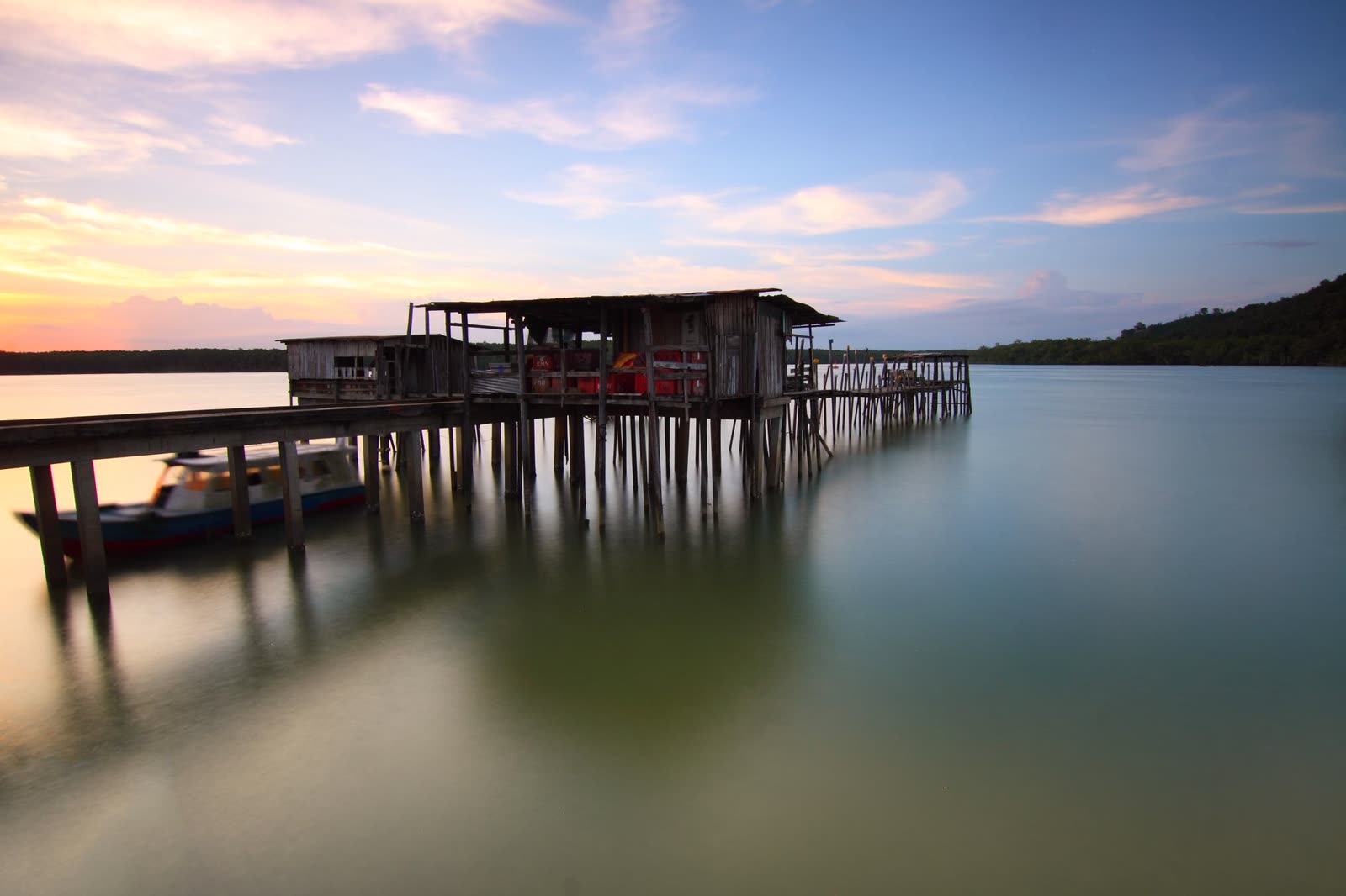 Rustic dock at sunset